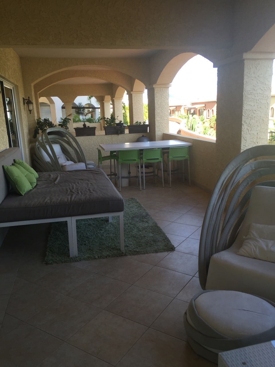 1.-for-sale-4-bedroom-4.5-bath-unfurnished-condo-cupecoy-st.-maarten-covered-terrace-with-view